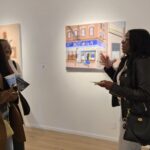 Visitors and Artist, Denise Coke in front of Bodega (Just Another Day).